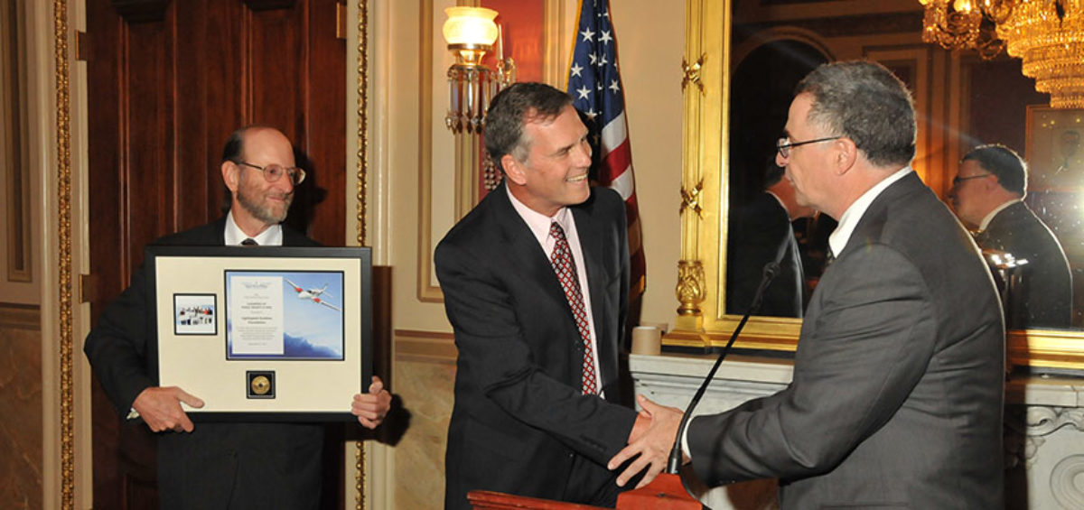 Allan Schrader accepting the NAA Award