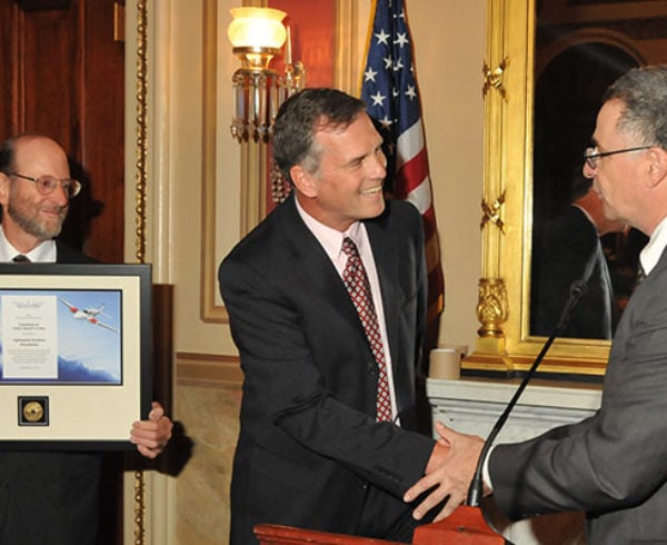 Allan Schrader accepting the NAA Award