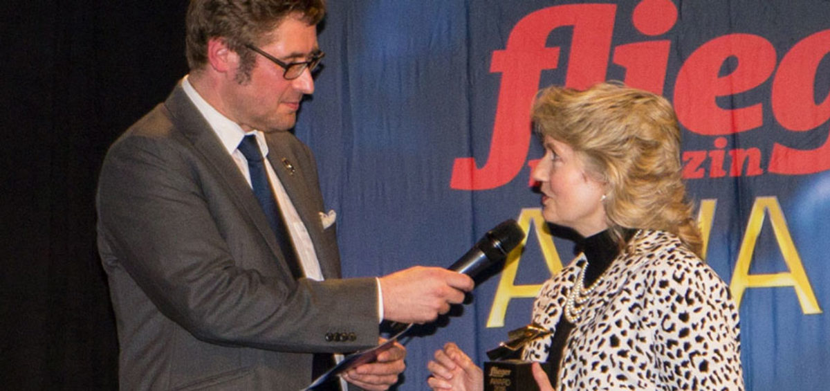 Teresa De Mers accepting the Innovation award from Flieger magazine